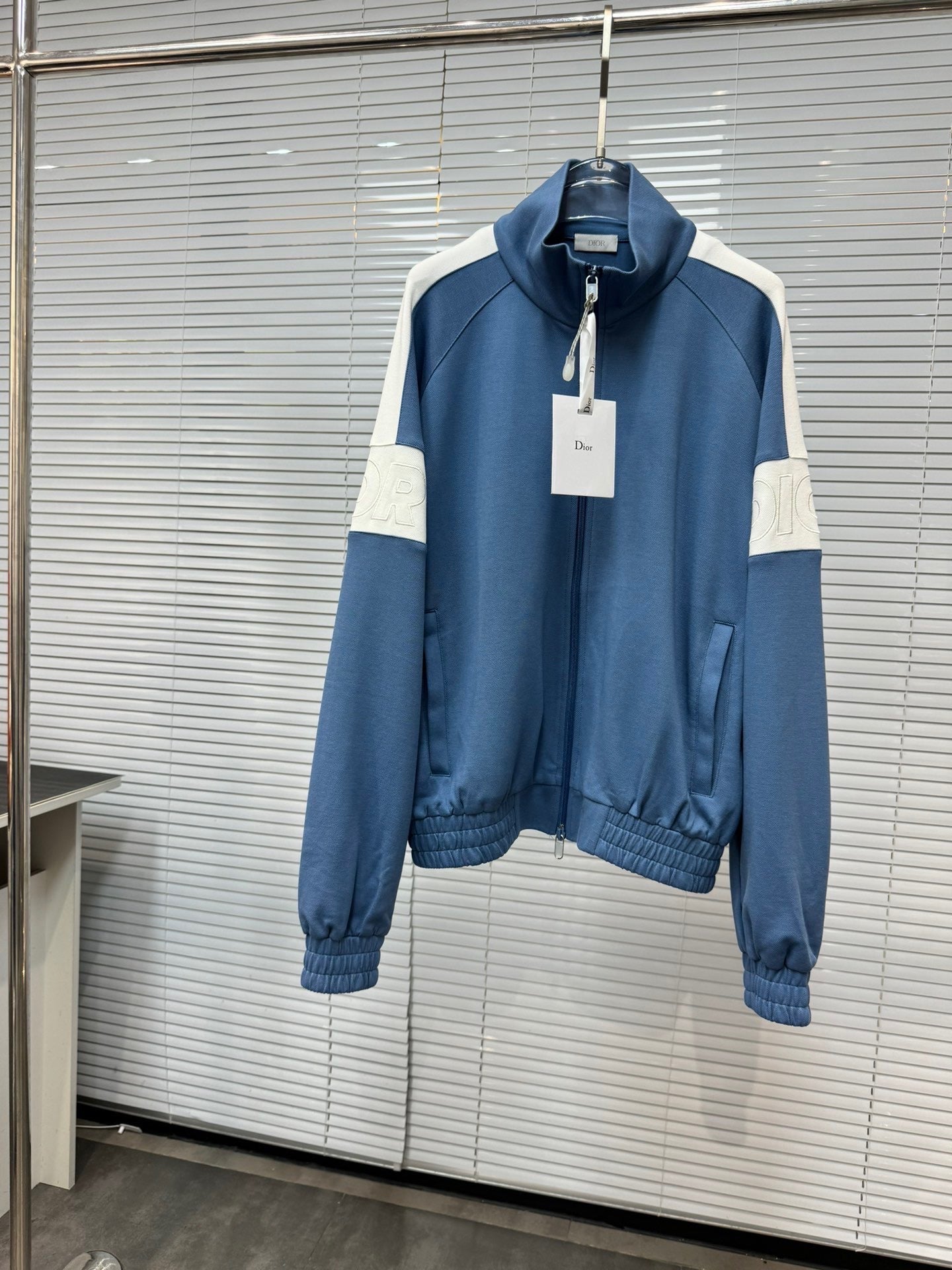 CD 2024 blue zipped jacket