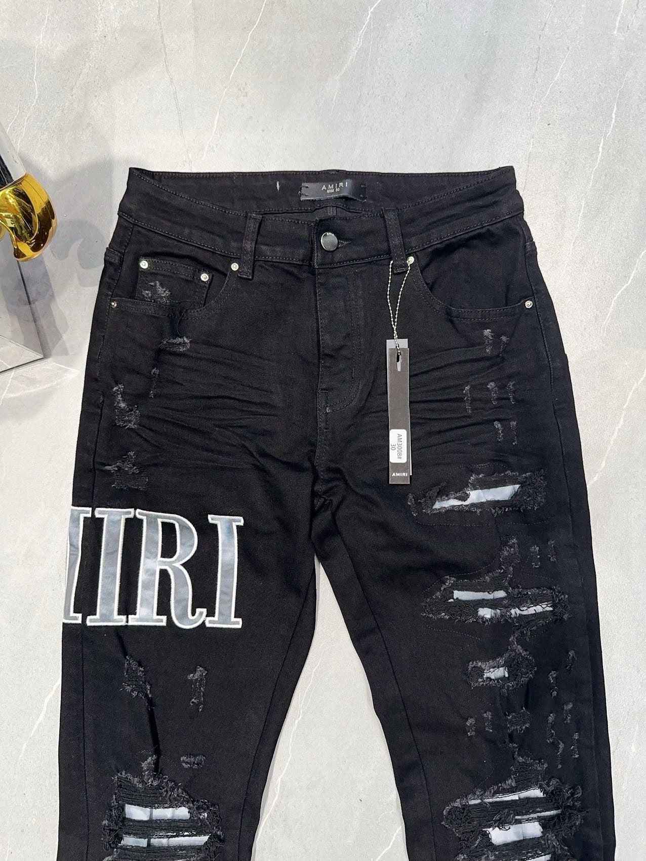 Jean logo embroidered amr