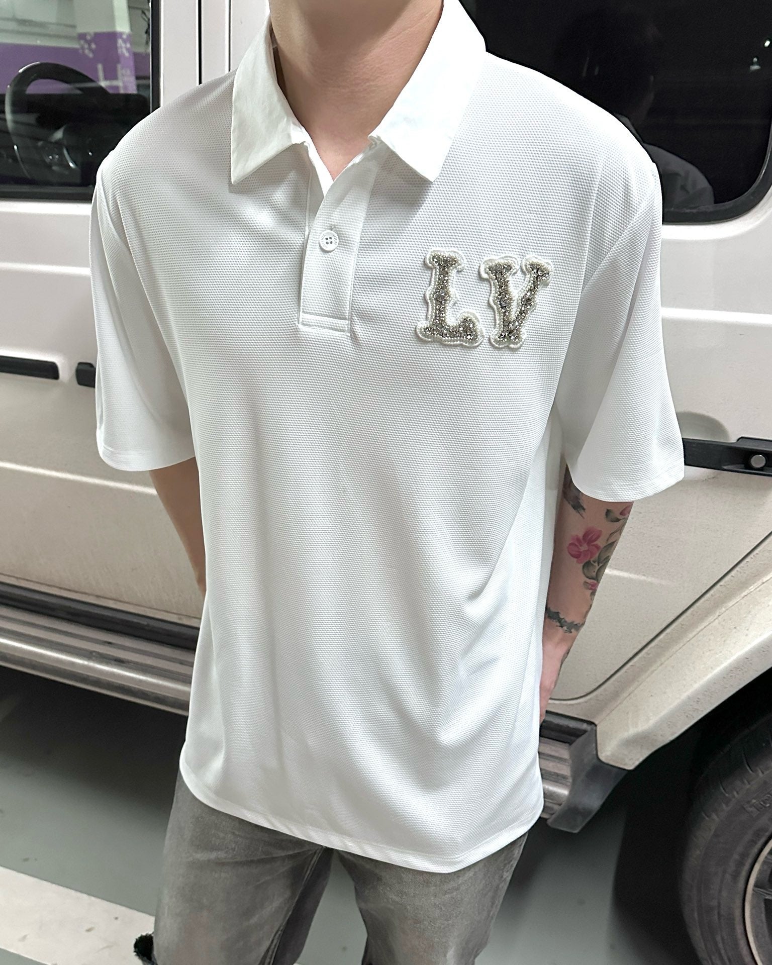 Polo shirt with embroidered LV patch